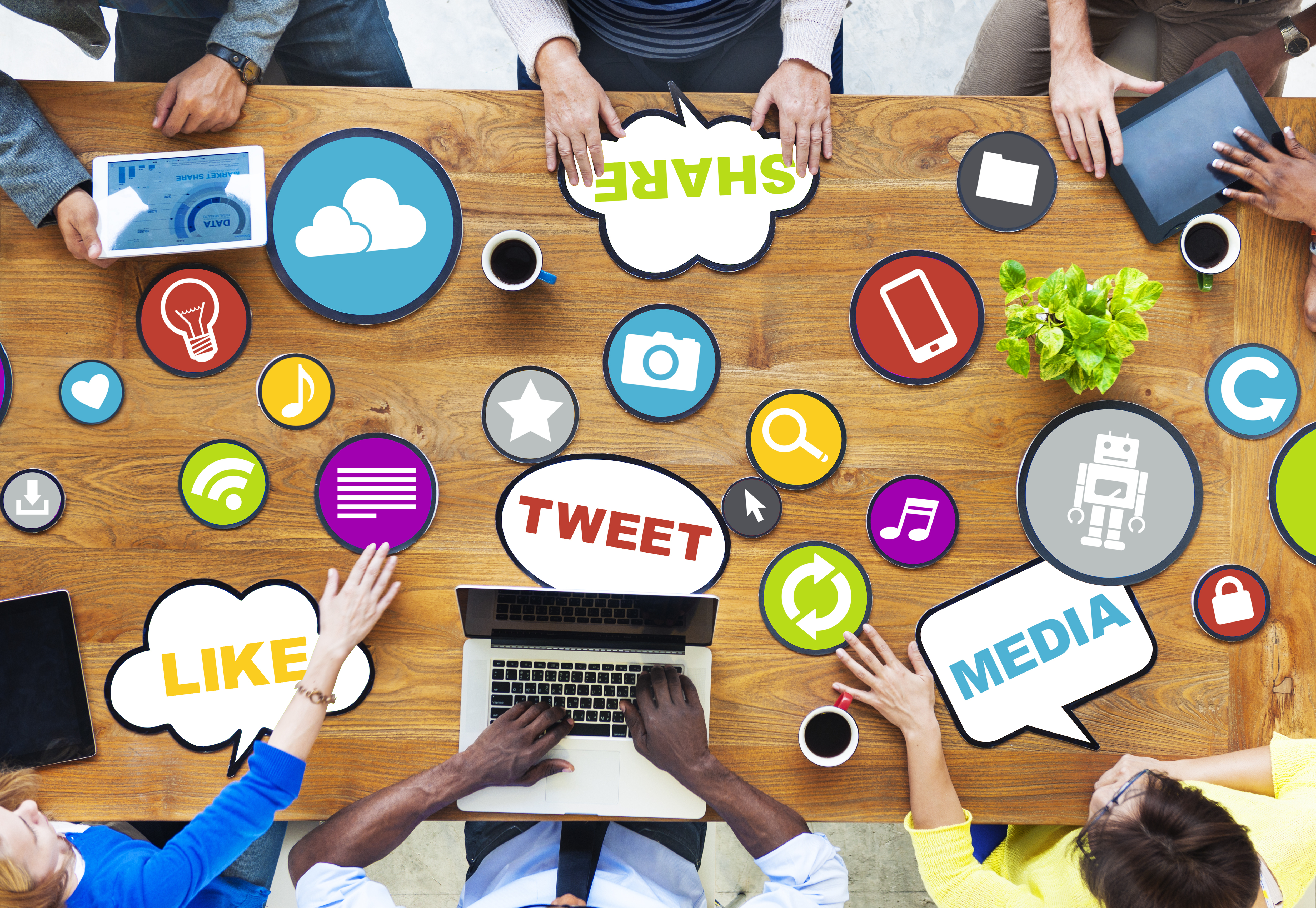 desk with social media terms